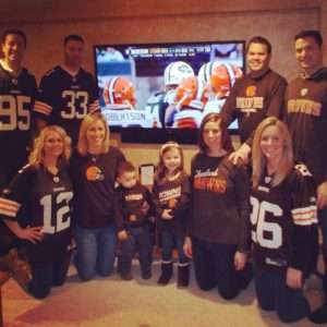 family and freinds wearing their browns swag