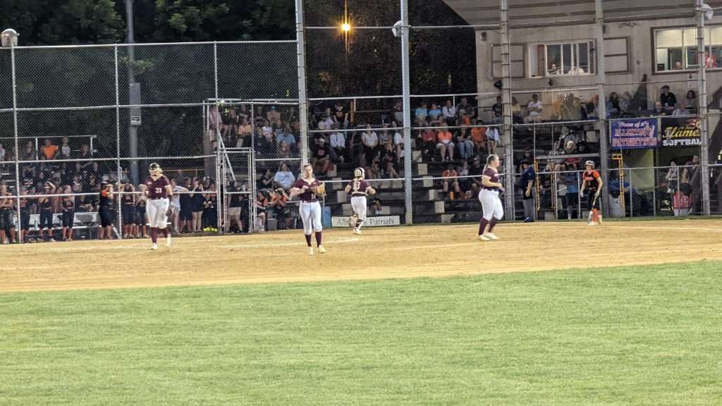 action shot of high school softball game