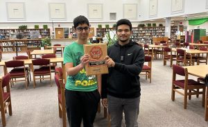 2 High school boys accepting EPSEI award