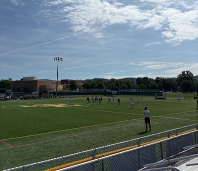 Emmaus team on the field after scoring against opponents, Oak Knoll.