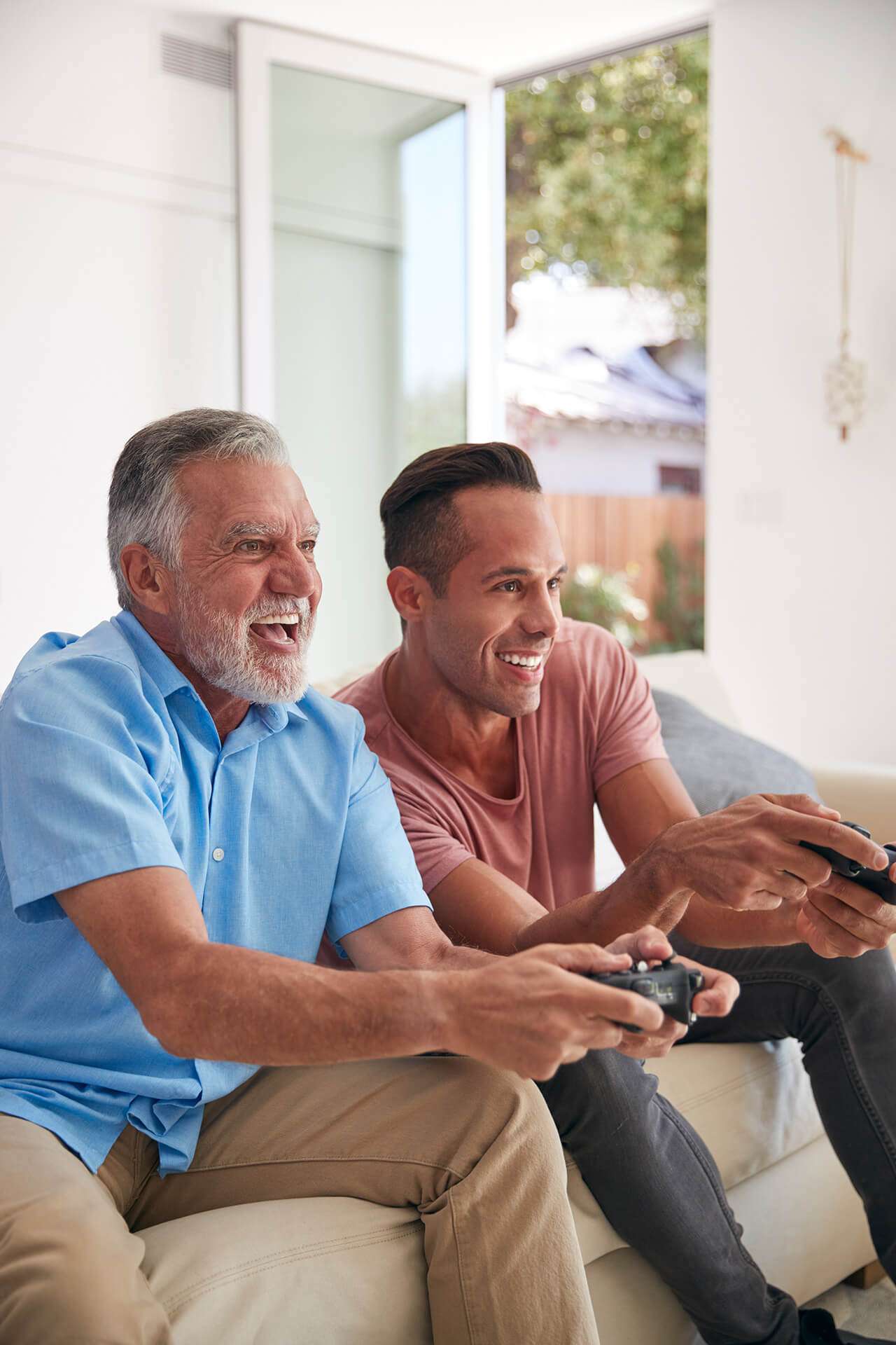 Family with video game controllers