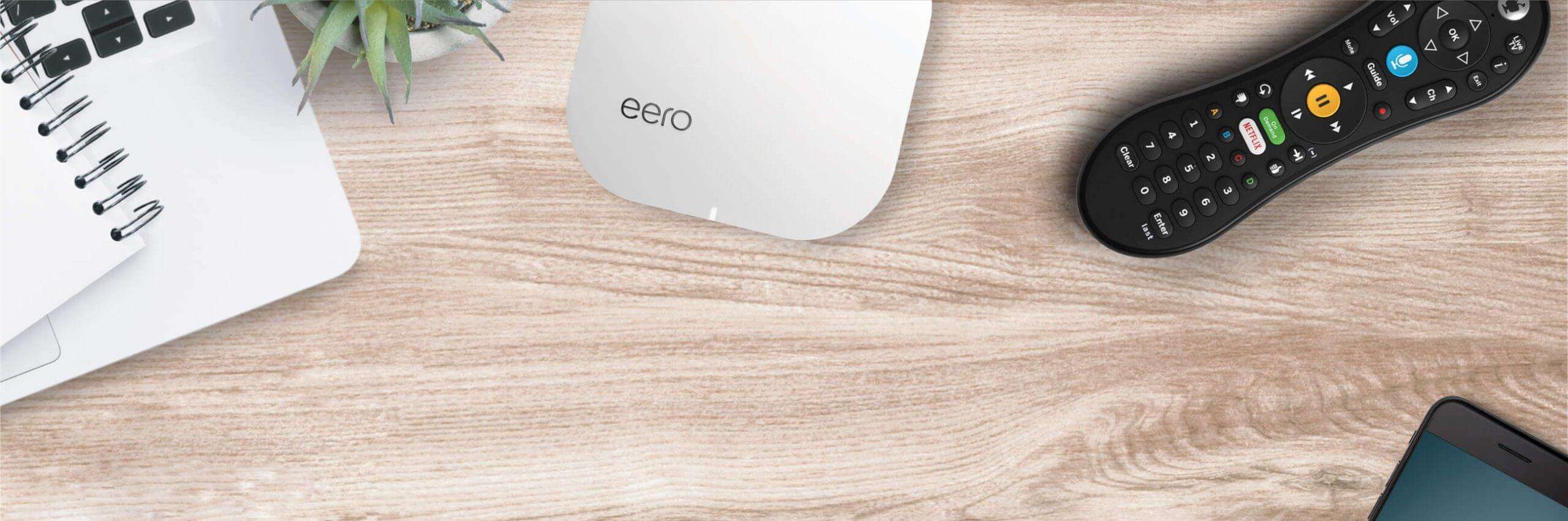 desktop with remote and eero