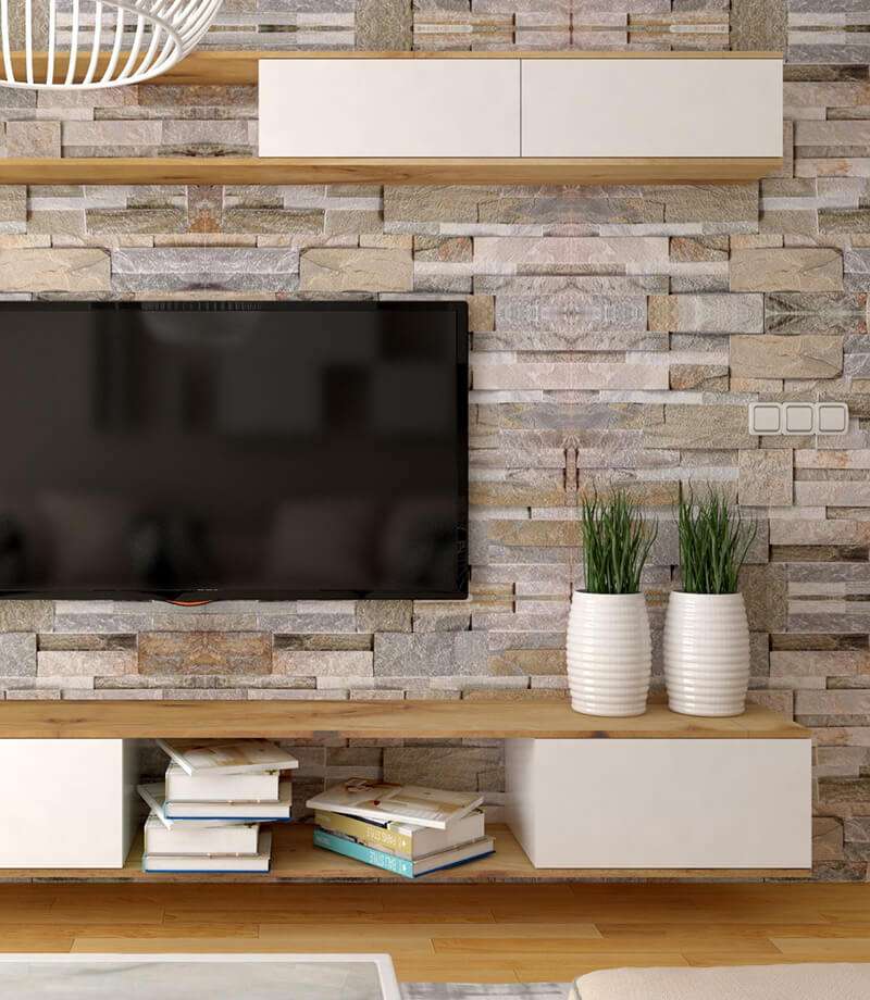 Wall mounted television over shelf