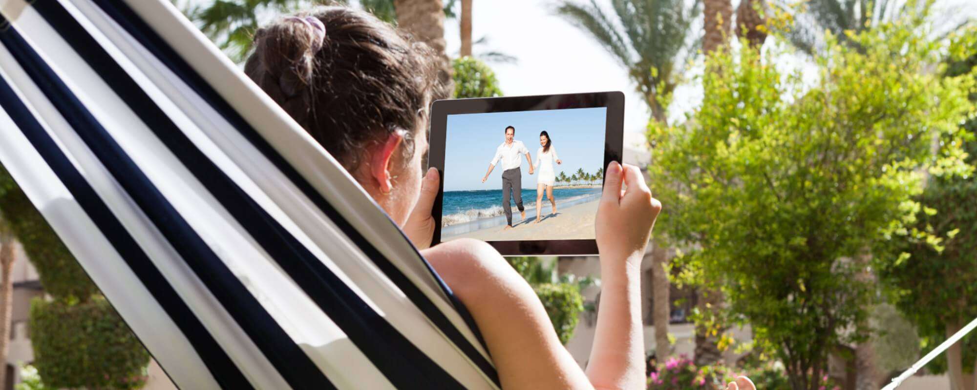 a woman watching a video on a tablet