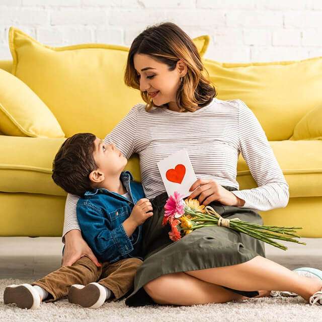 Mom and son share a smile