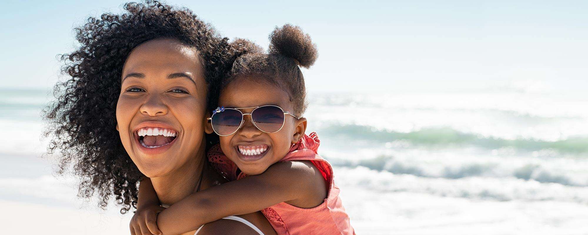 Summer TV guide -Mom and daughter at the shore