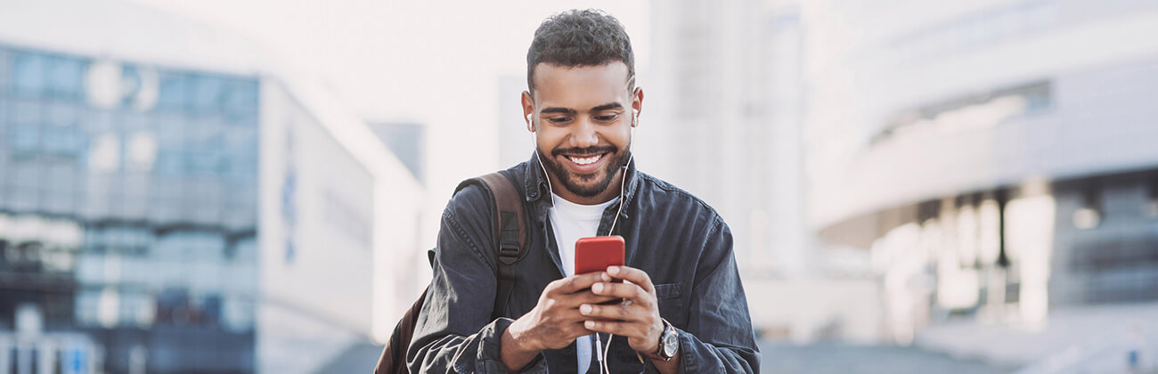 Man on mobile phone in urban setting