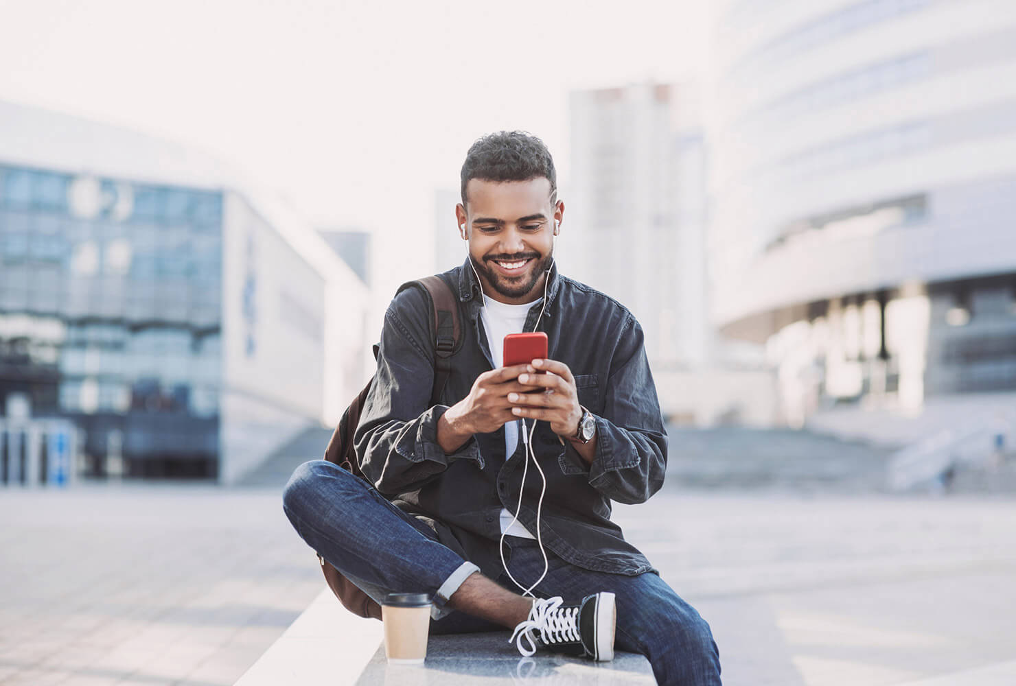 Man on mobile phone in urban setting