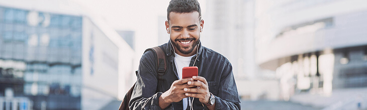 Man on mobile phone in urban setting