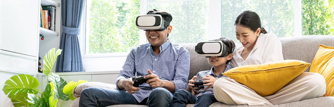 Asian family playing VR games