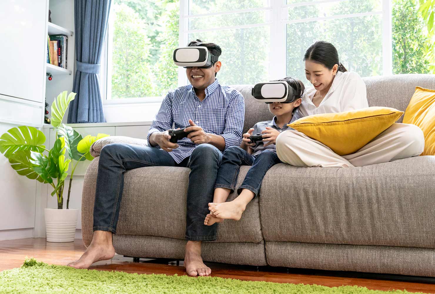 Asian family playing VR games