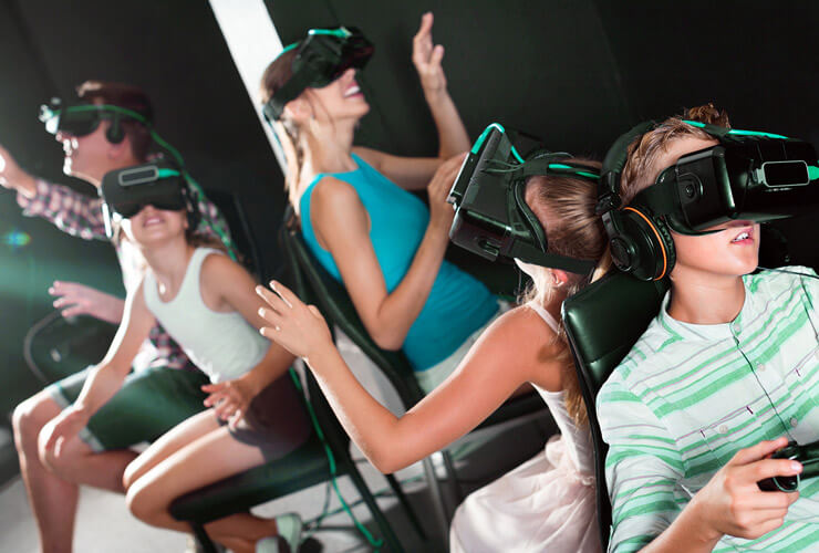 family of five uses VR headsets to game together at home