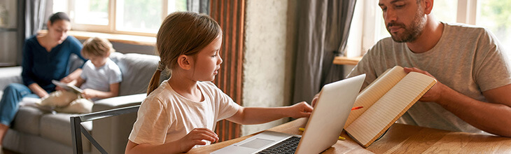 Connected family on laptop and tablet