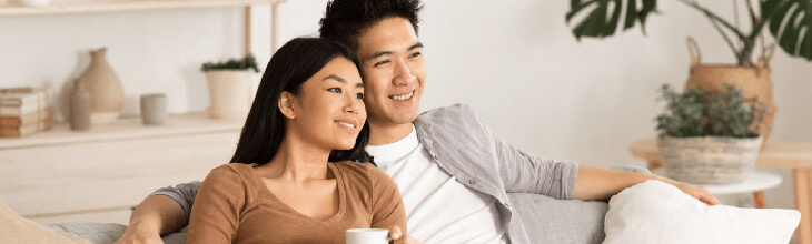 couple figuring out what to watch tonight