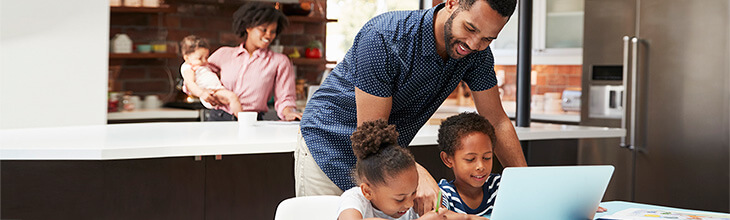family in kitchen uses eero Internet Backup