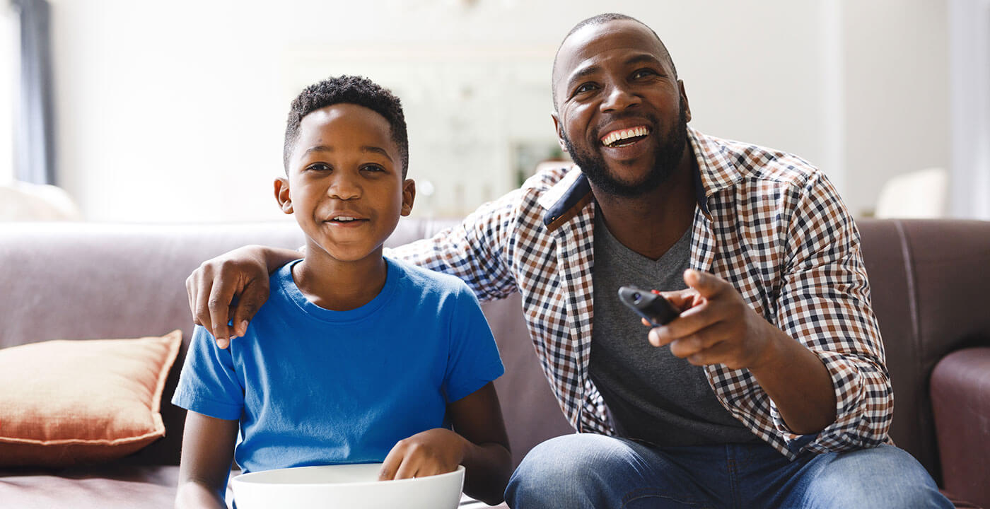 Fathers Day - Dad and son watch shows together