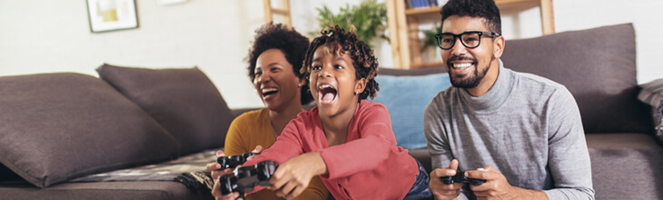family has fun gaming together